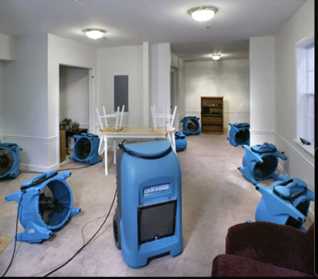 Air movers and dehumidifier setup for Water Damage Restoration in Hoquiam